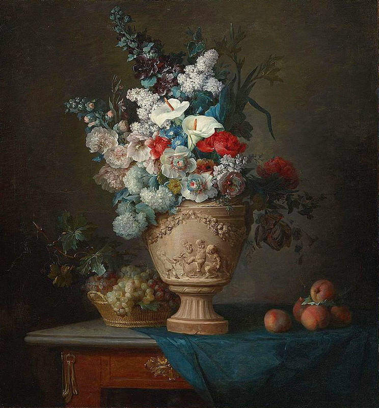 flowers in a terracotta vase with peaches and grapes